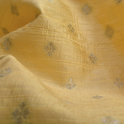 Lemon Yellow Tussar Raw Silk Fabric with Small Flower Butta Design