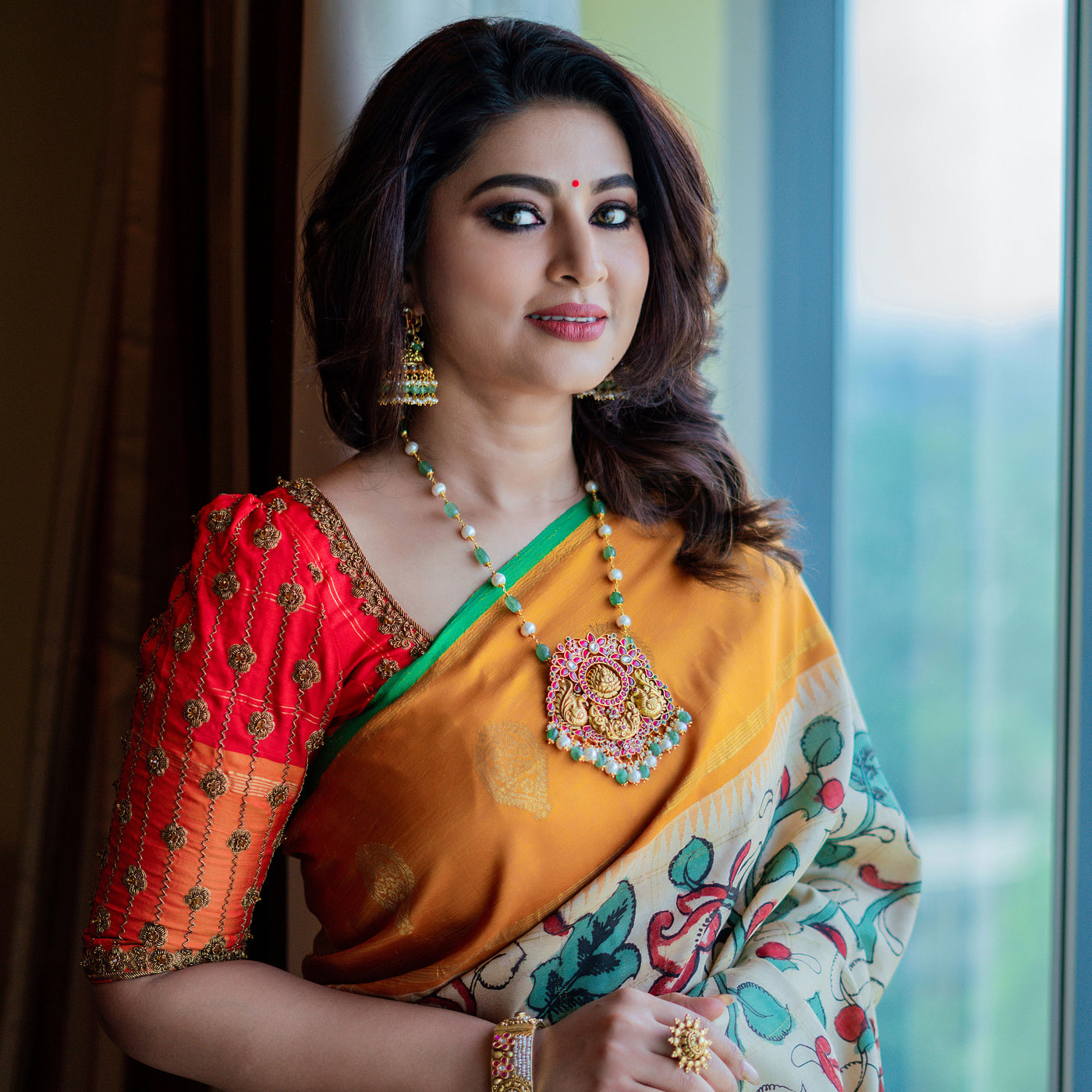 Cream Kalamkari Silk Saree with red blouse