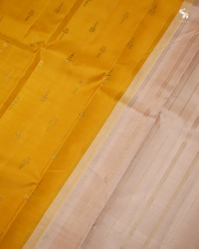 Yellow Kanchi Silk Saree with Small Zari Butta Design
