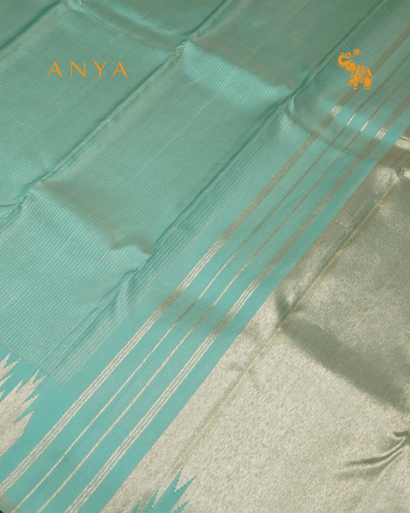 Pastel Green Kanchi Silk Saree with Small Zari Checks Design