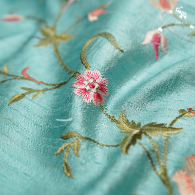 Rexona Blue Tussar Raw Silk Fabric with Floral Creeper Embroidery Design