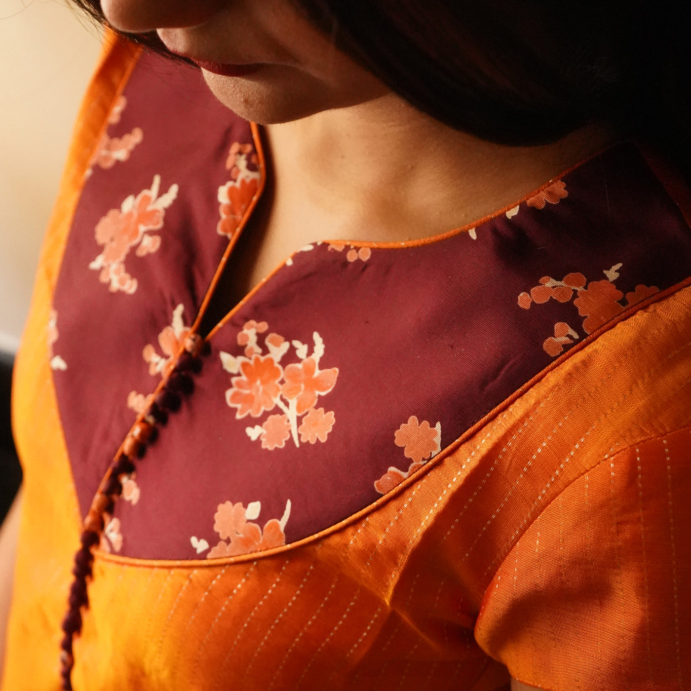 Orange Muthu Seer Kanchi Silk Salwar with V Pakku Floral Silk Printed Bottom