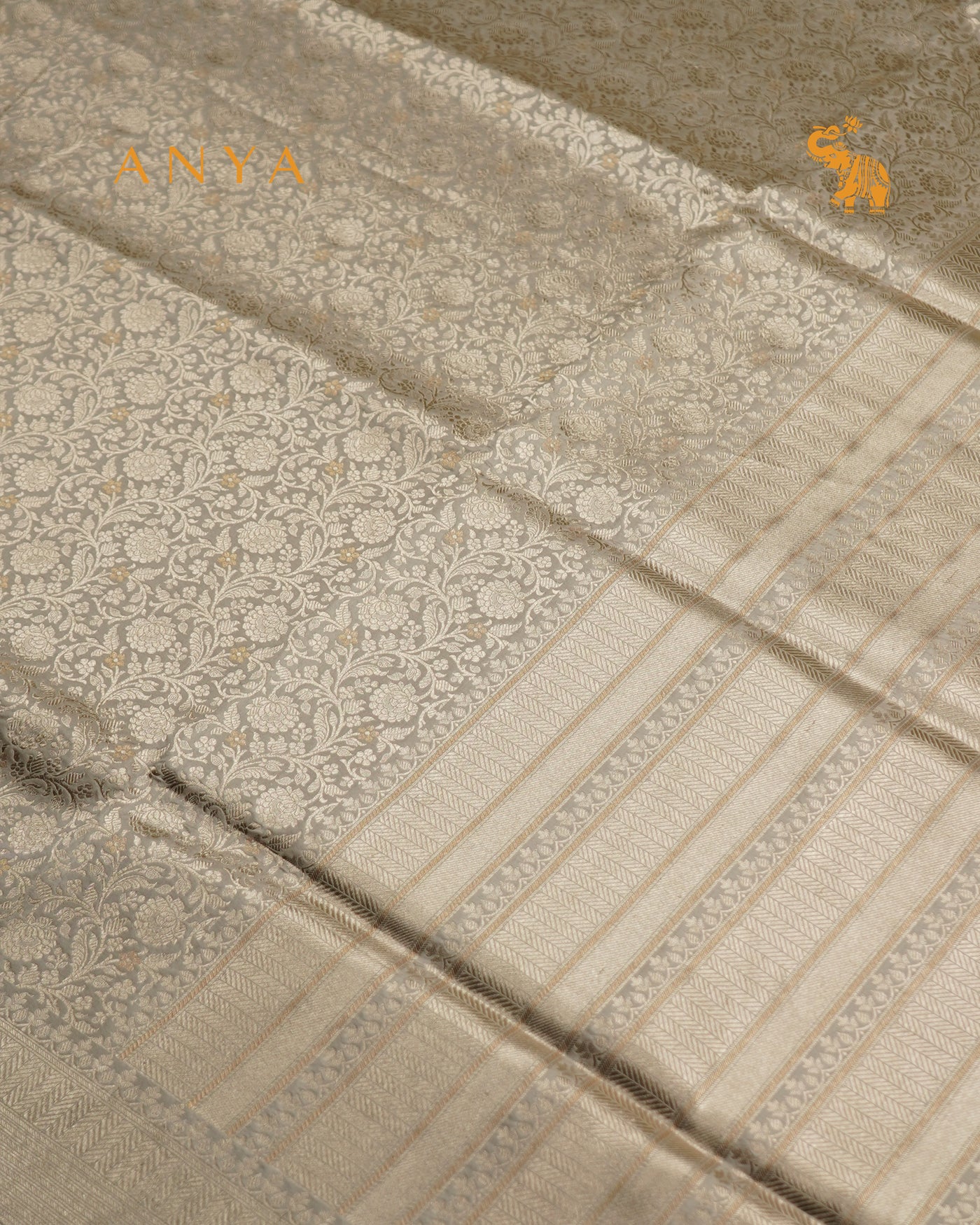 Off White Banarasi Silk Saree with Floral Creeper Design