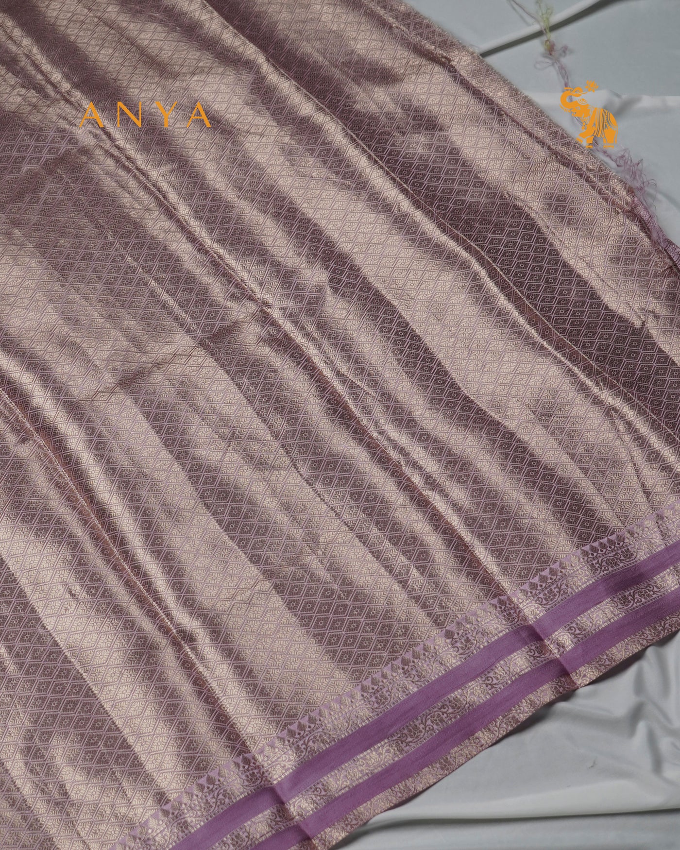 Lavender Satin Silk Banarasi Saree with Floral Zari Motifs Design