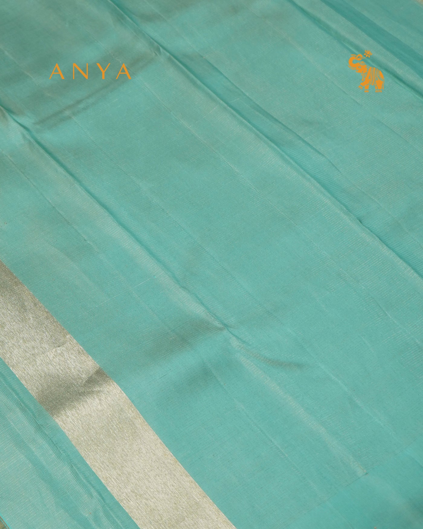 Pastel Green Kanchi Silk Saree with Small Zari Checks Design