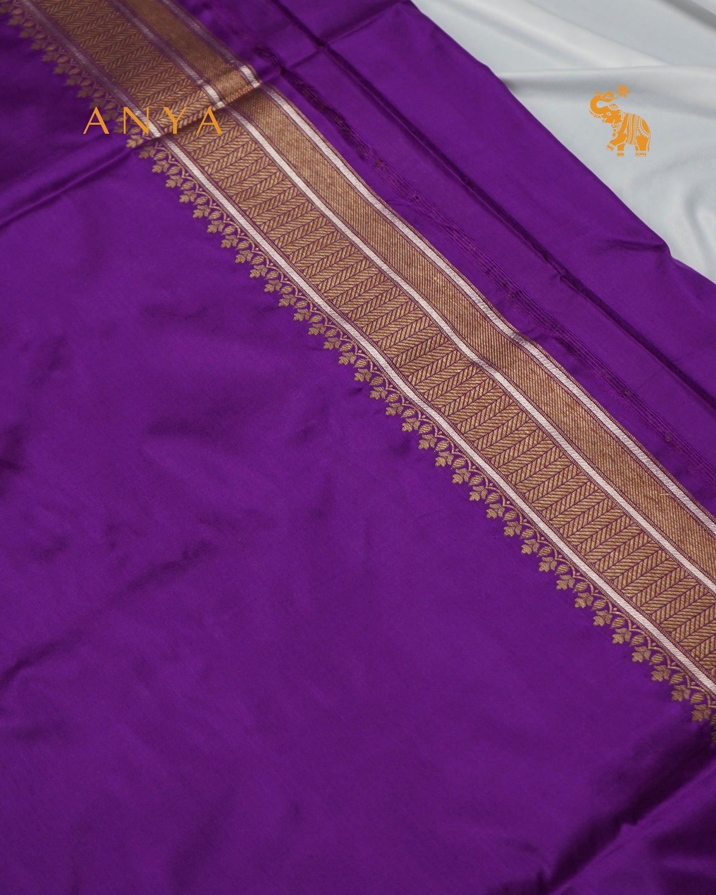 Purple Banarasi Silk Saree with Floral Creeper Design