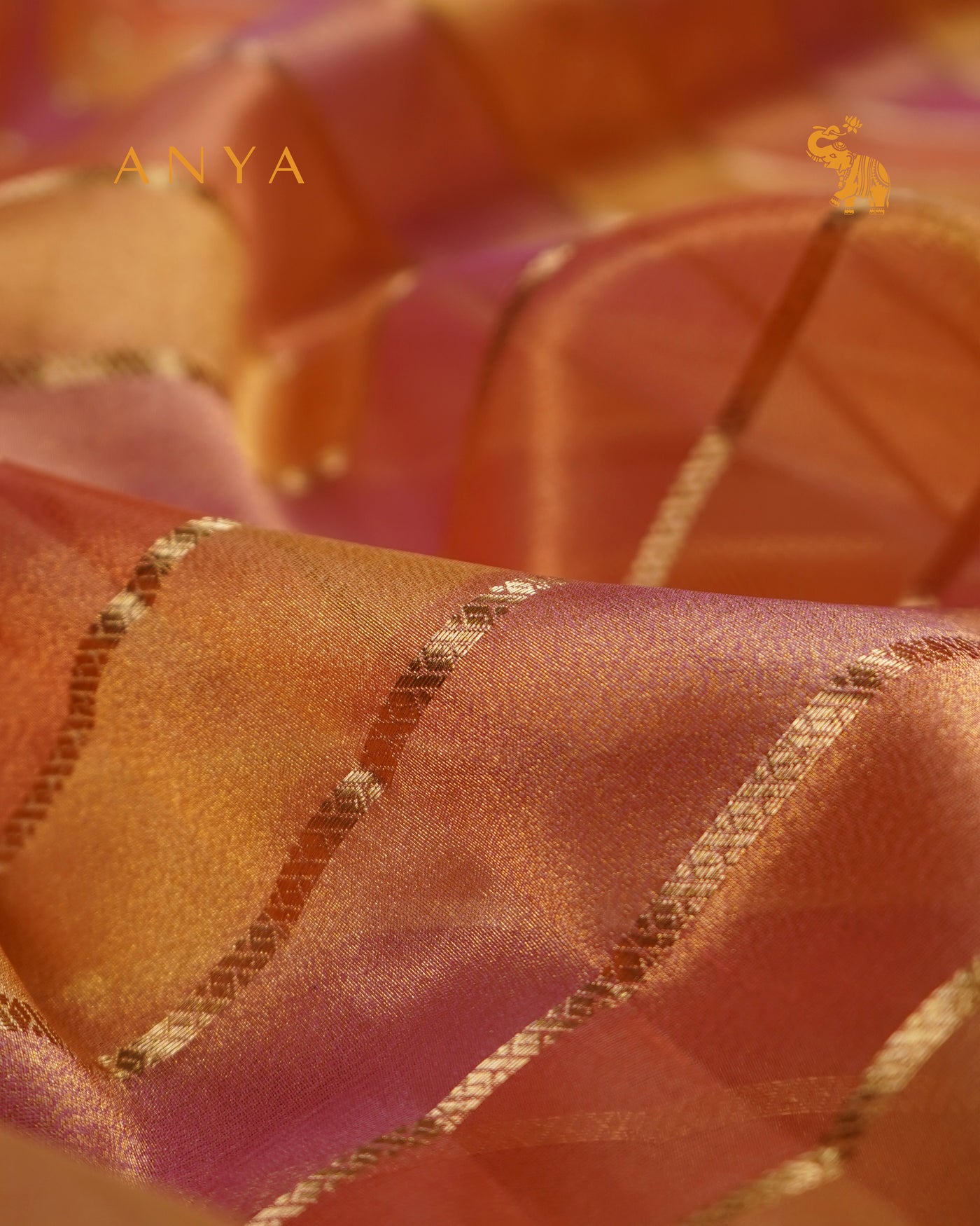 Peach Pink Organza Tissue Fabric with Zari Stripes Design