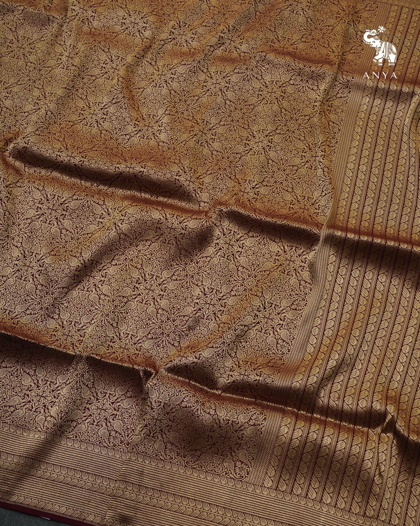 Maroon Banarasi Silk Saree with Peacock Zari Creeper Design