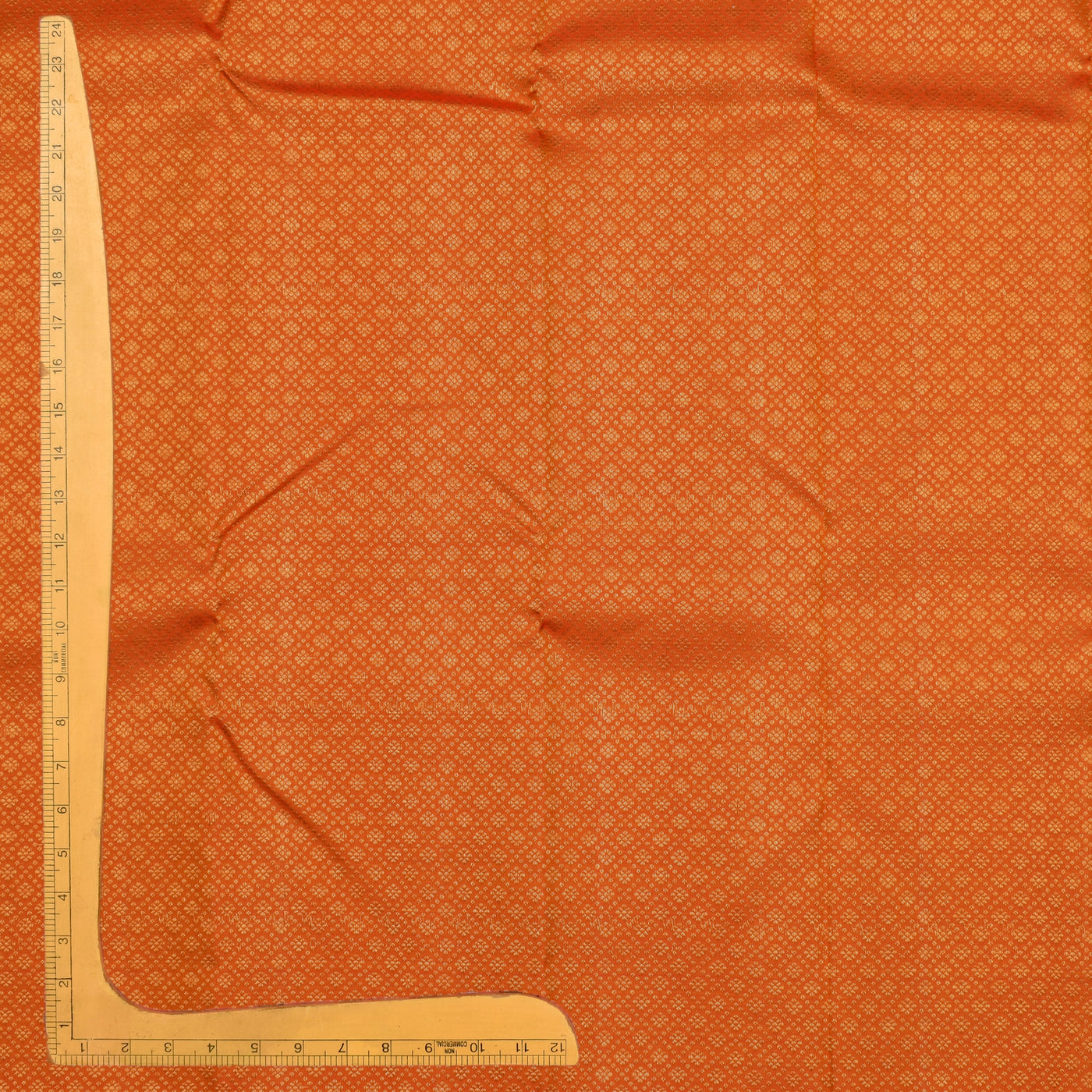 Milagai Orange Kanchi Silk Fabric with Kamalam Butta Design