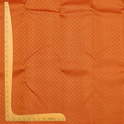 Milagai Orange Kanchi Silk Fabric with Kamalam Butta Design