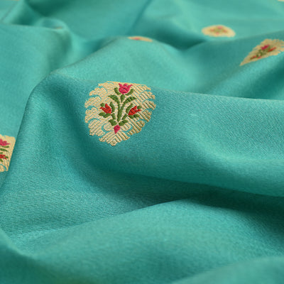 Rexona Blue Tussar Raw Silk Fabric with Flower Butta Design