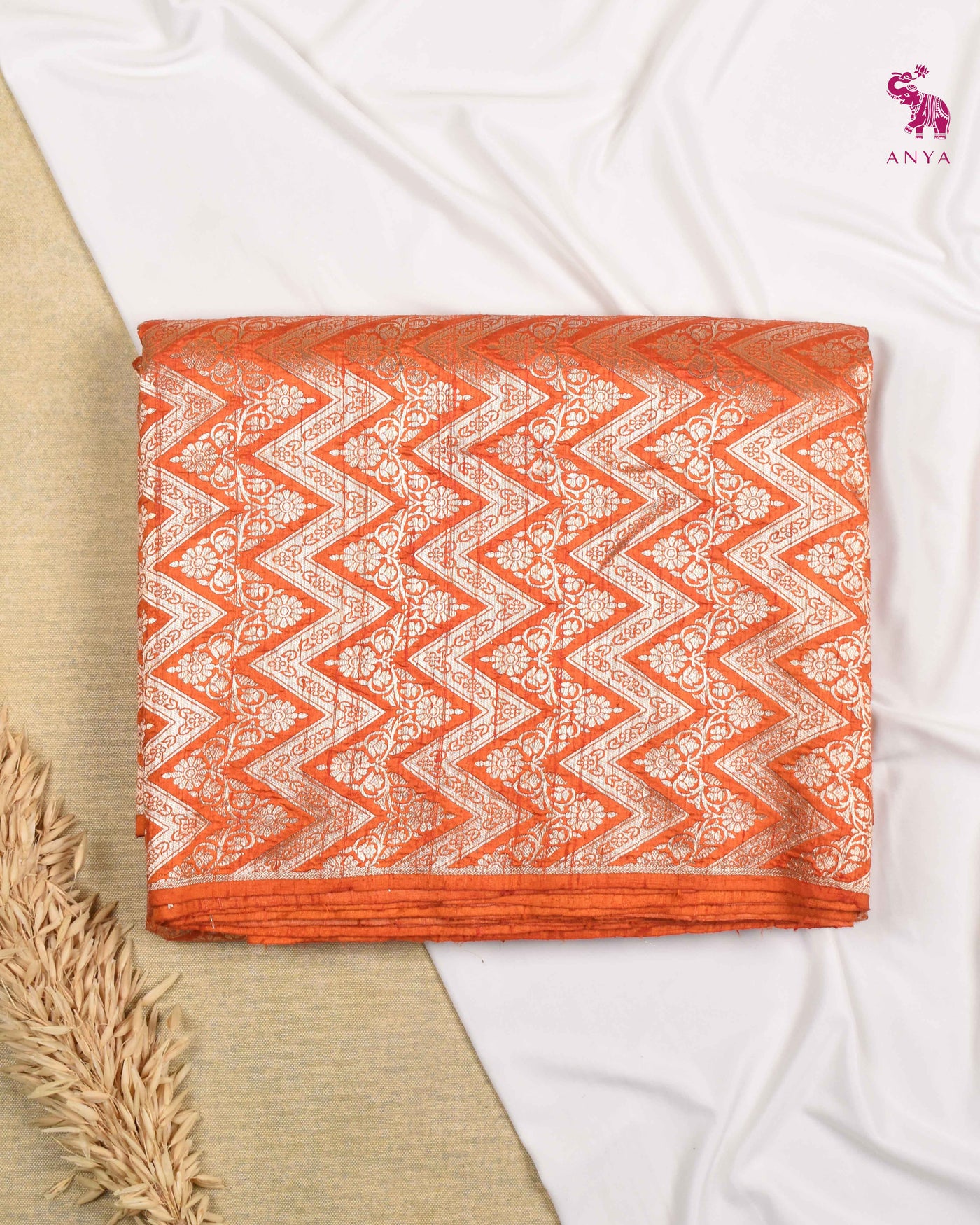 Rust Tussar Raw Silk Fabric with Zig Zag Creeper Design