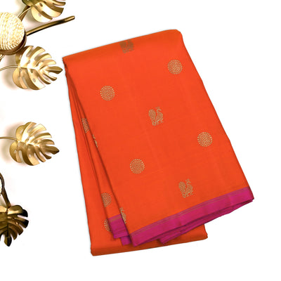Orange Kanchipuram Silk Saree with Mayil Chakaram Design