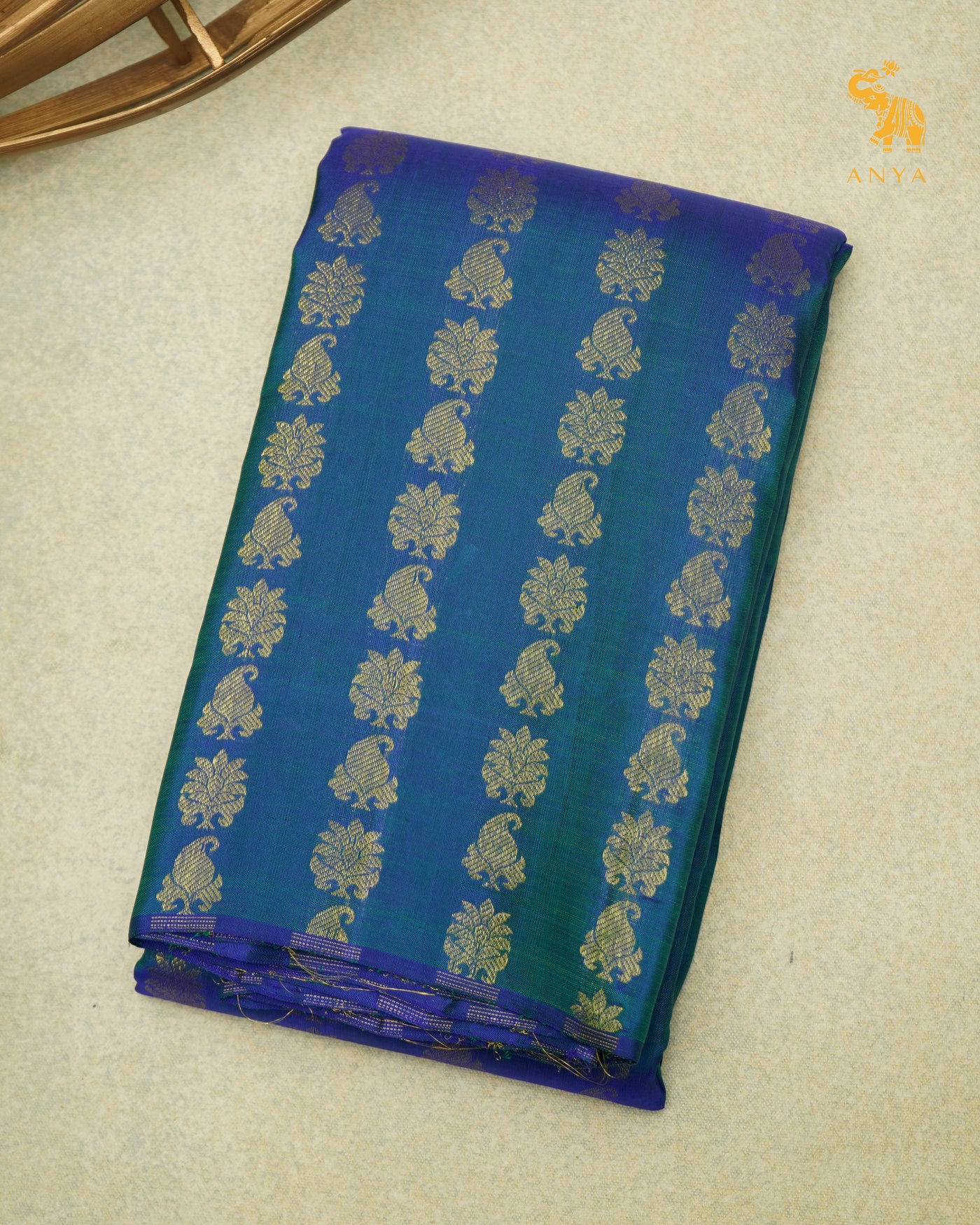 Peacock Blue Kanchi Silk Fabric with Zari Butta Design