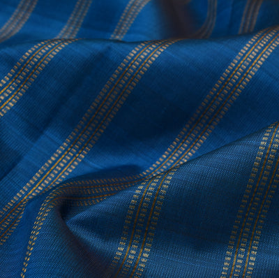 Peacock Blue Kanchi Silk Fabric with Zari Stripes Design