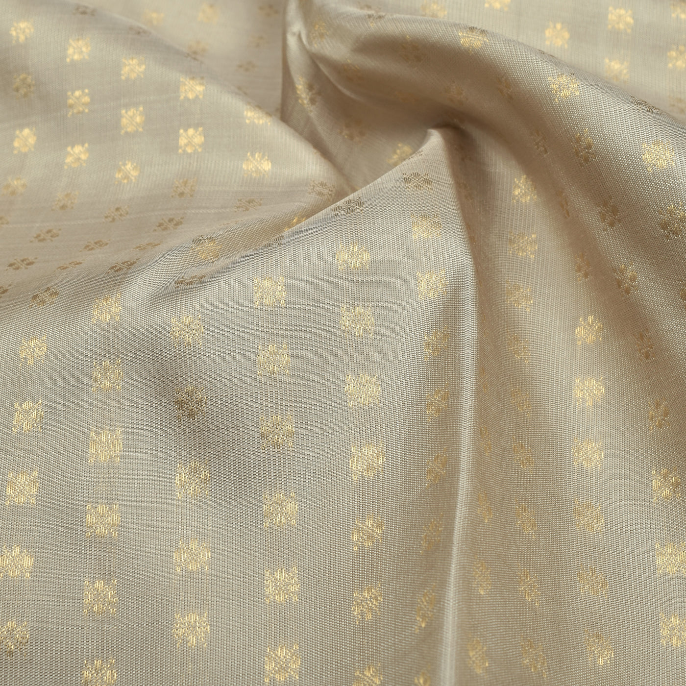 Off White Kanchi Silk Fabric with Small Zari Butta Design
