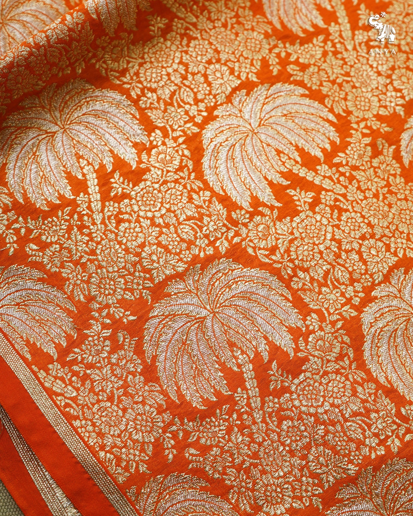 Orange Banarasi Silk Fabric with Floral Zari Design