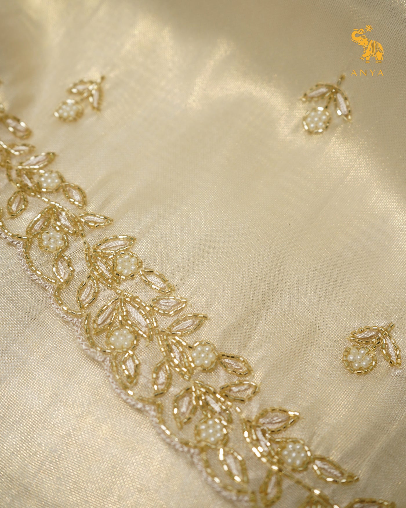 Off White Tissue Organza Saree with Embroidery Design
