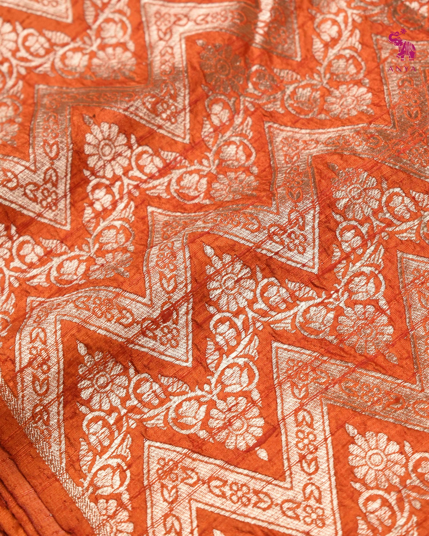 Rust Tussar Raw Silk Fabric with Zig Zag Creeper Design