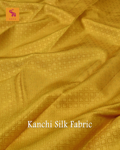 Oil Mustard Kanchi Silk Fabric with Kamalam Butta Design