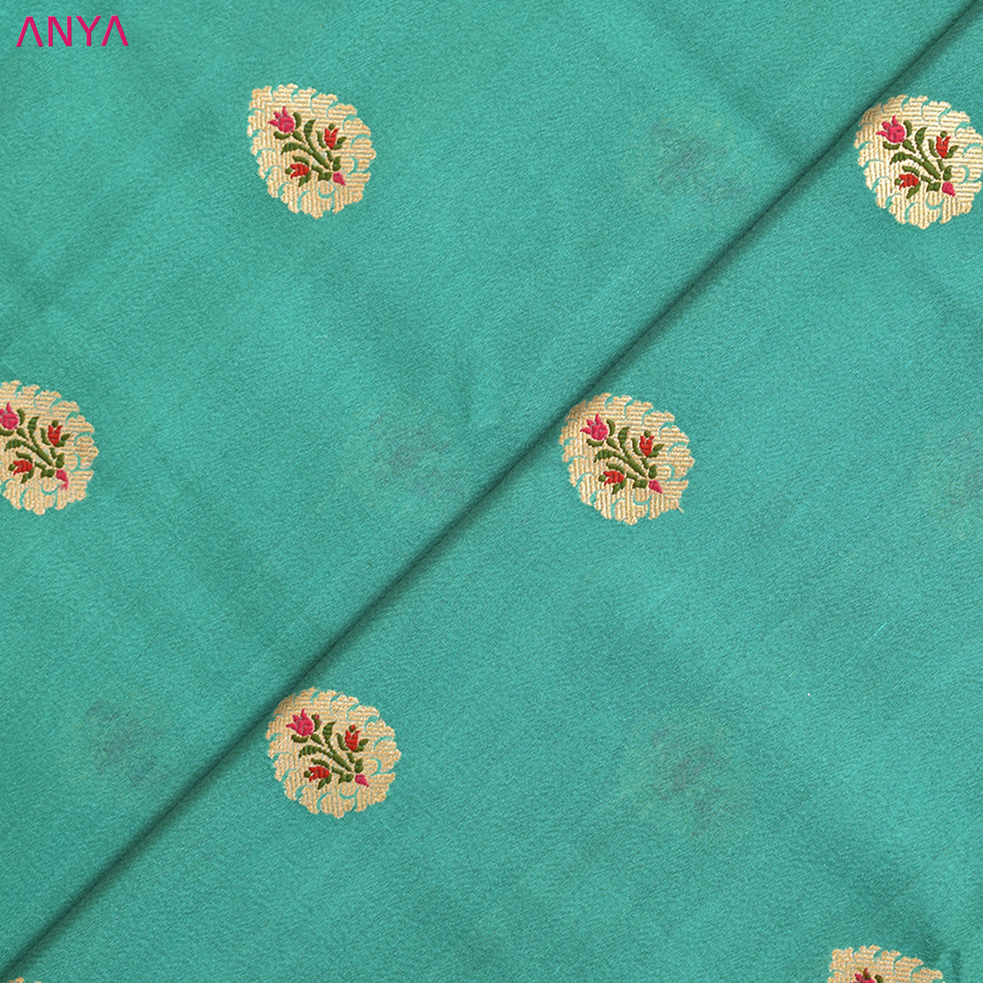 Rexona Blue Tussar Raw Silk Fabric with Flower Butta Design