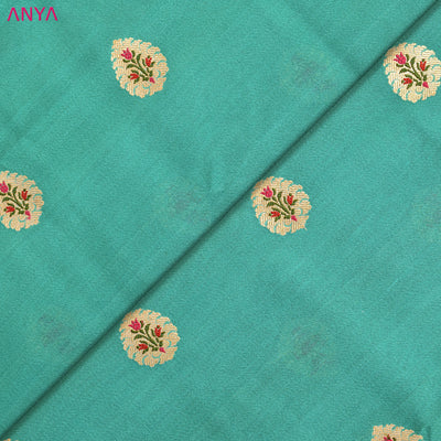 Rexona Blue Tussar Raw Silk Fabric with Flower Butta Design