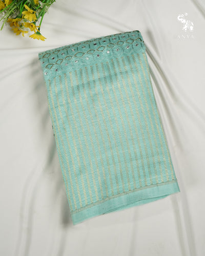 Aqua Green Printed Kanchi Silk Saree with Box Cut and Kutch Work Design