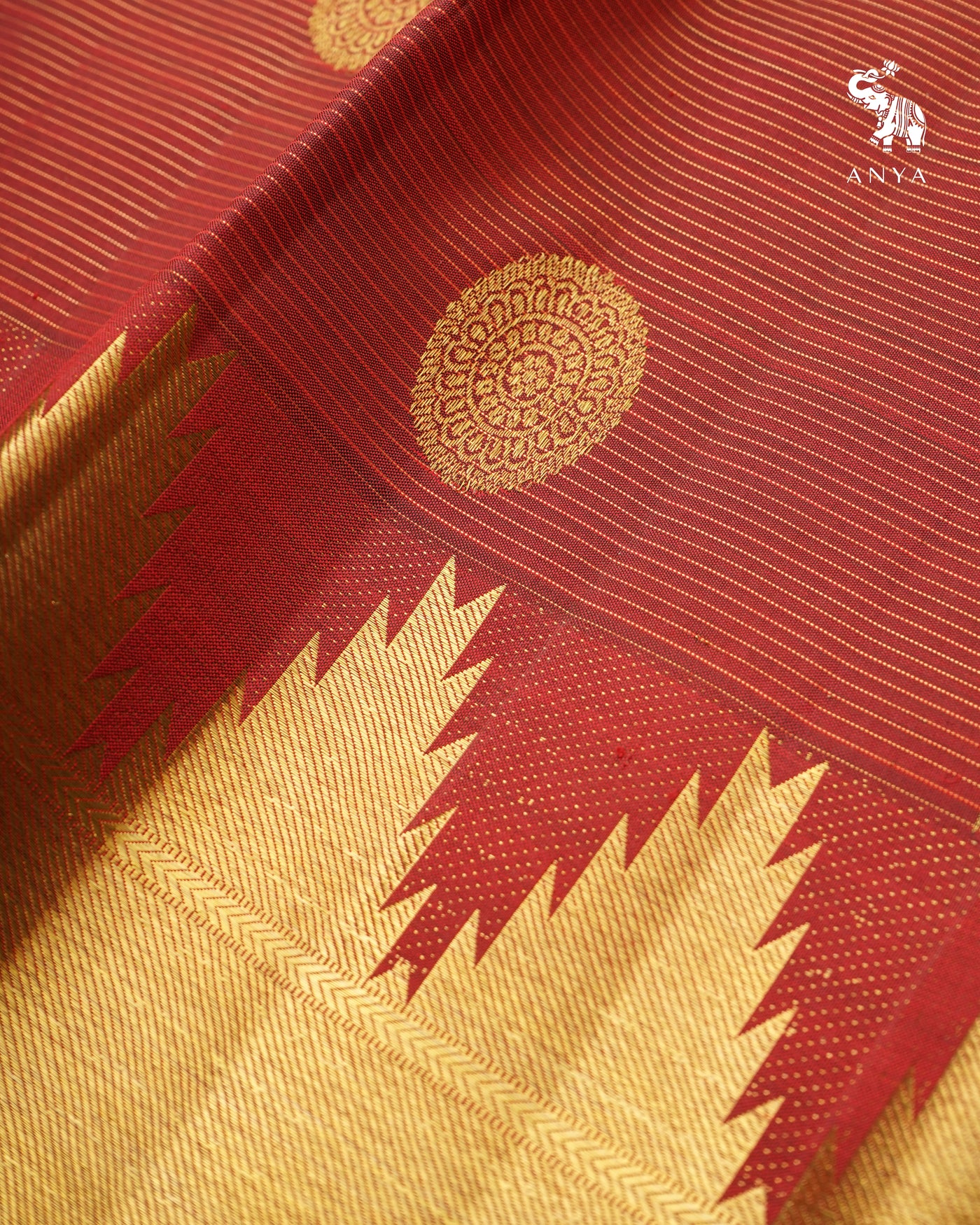 Maroon Kanchi Silk Saree with Zari Lines and Zari Butta Design