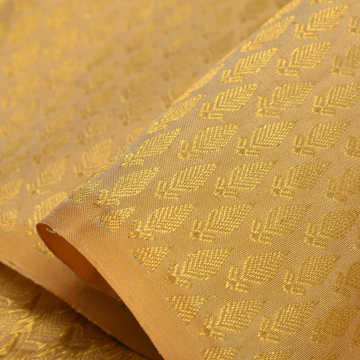 Gold Kanchi Silk Fabric with Leaf Zari Butta Design