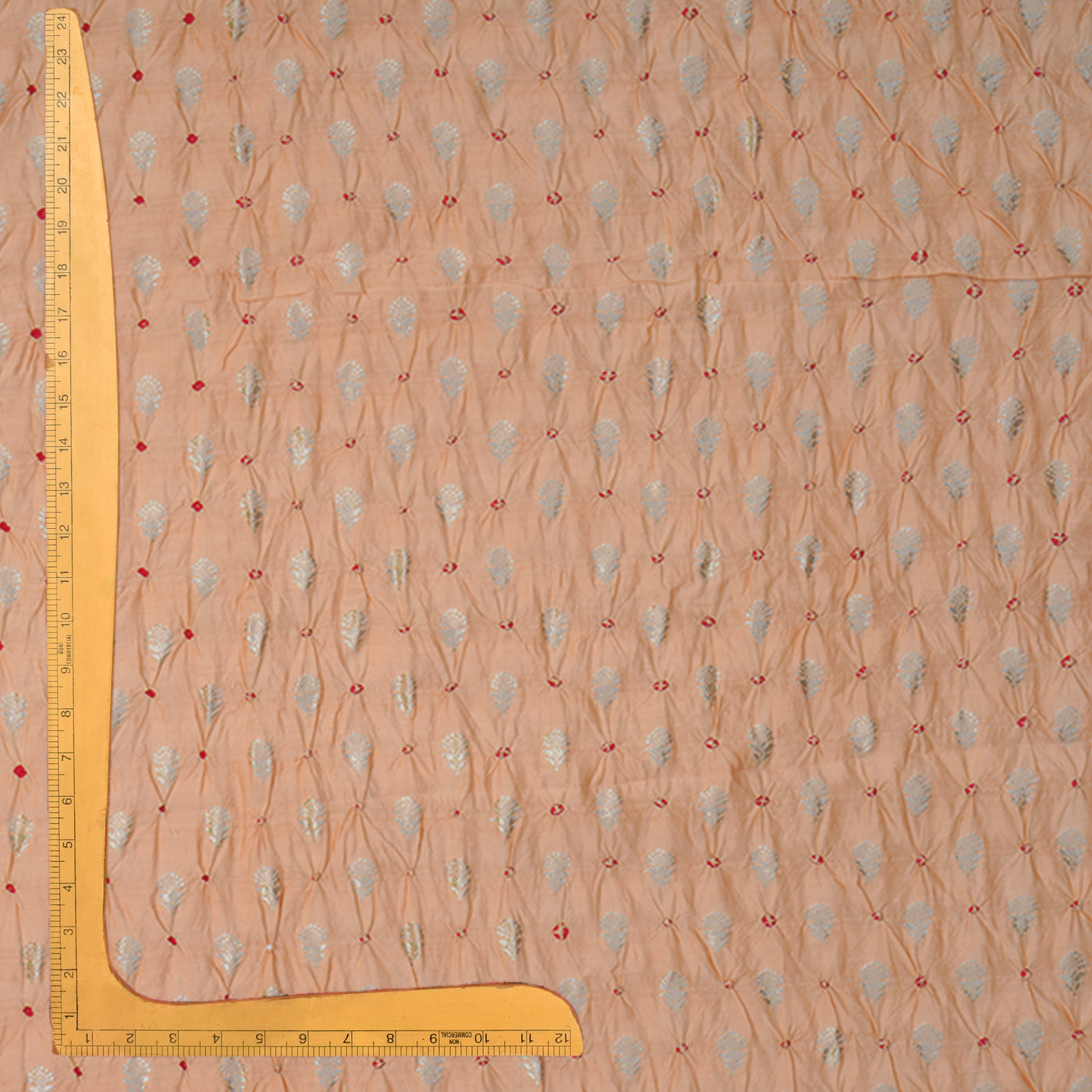 Peach Bandhani Silk Fabric with Small Zari Butta Design