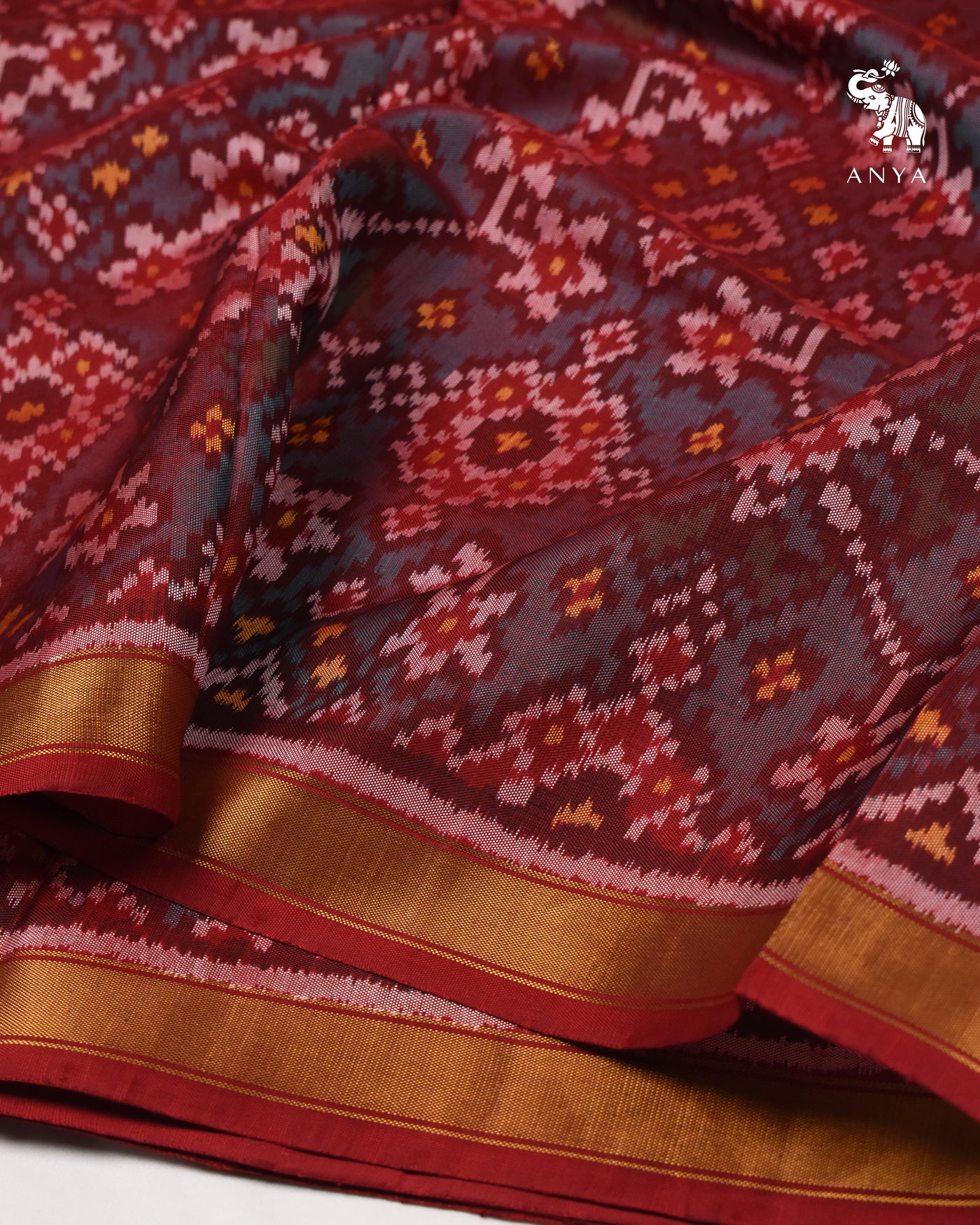 Green and Red Dual Tone Patan Patola Silk Fabric