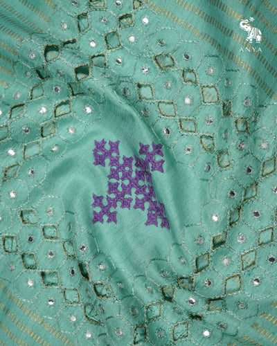 Aqua Green Printed Kanchi Silk Saree with Box Cut and Kutch Work Design