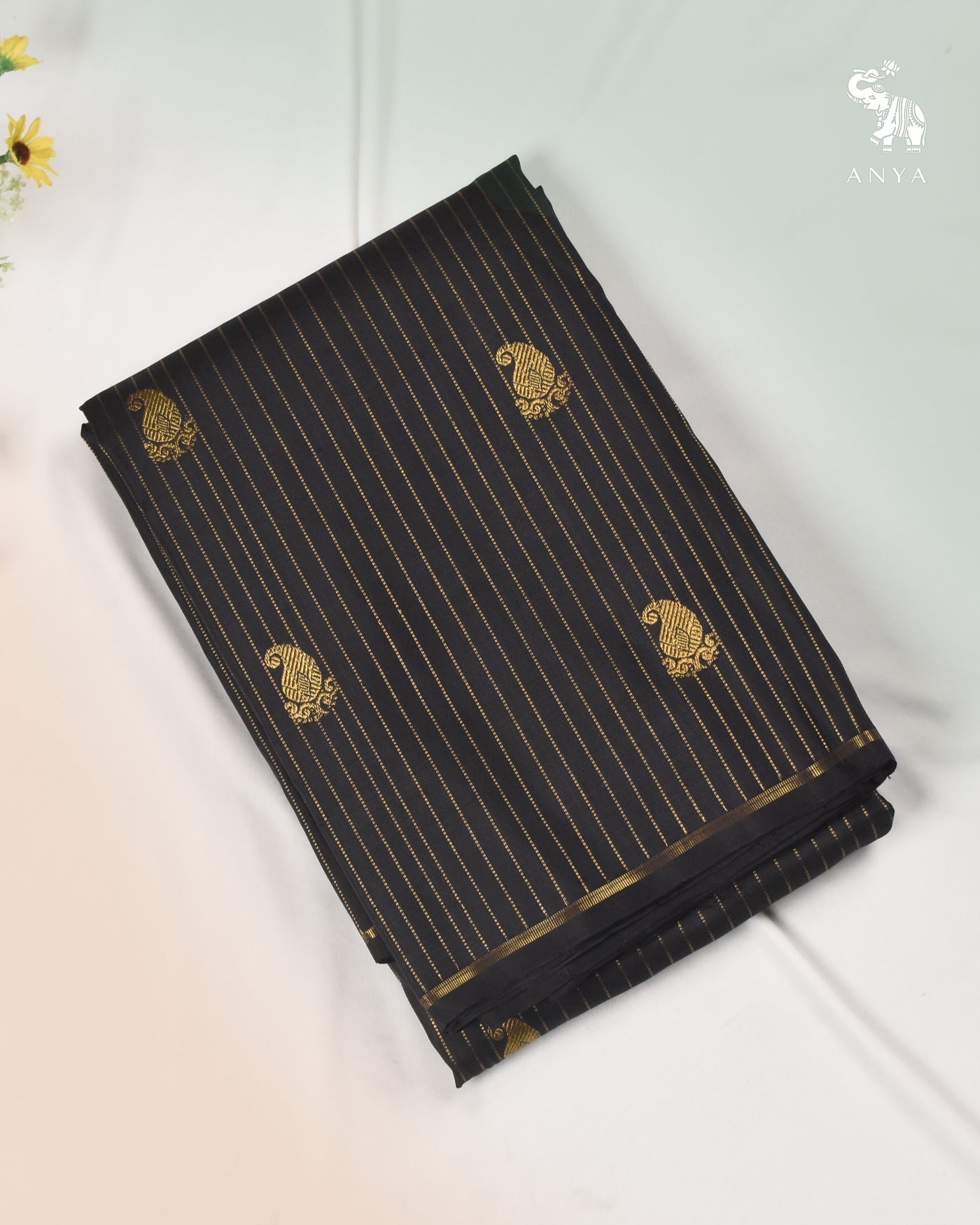 Black Kanchi Silk Fabric with Muthu Seer Lines and Mango Butta Design