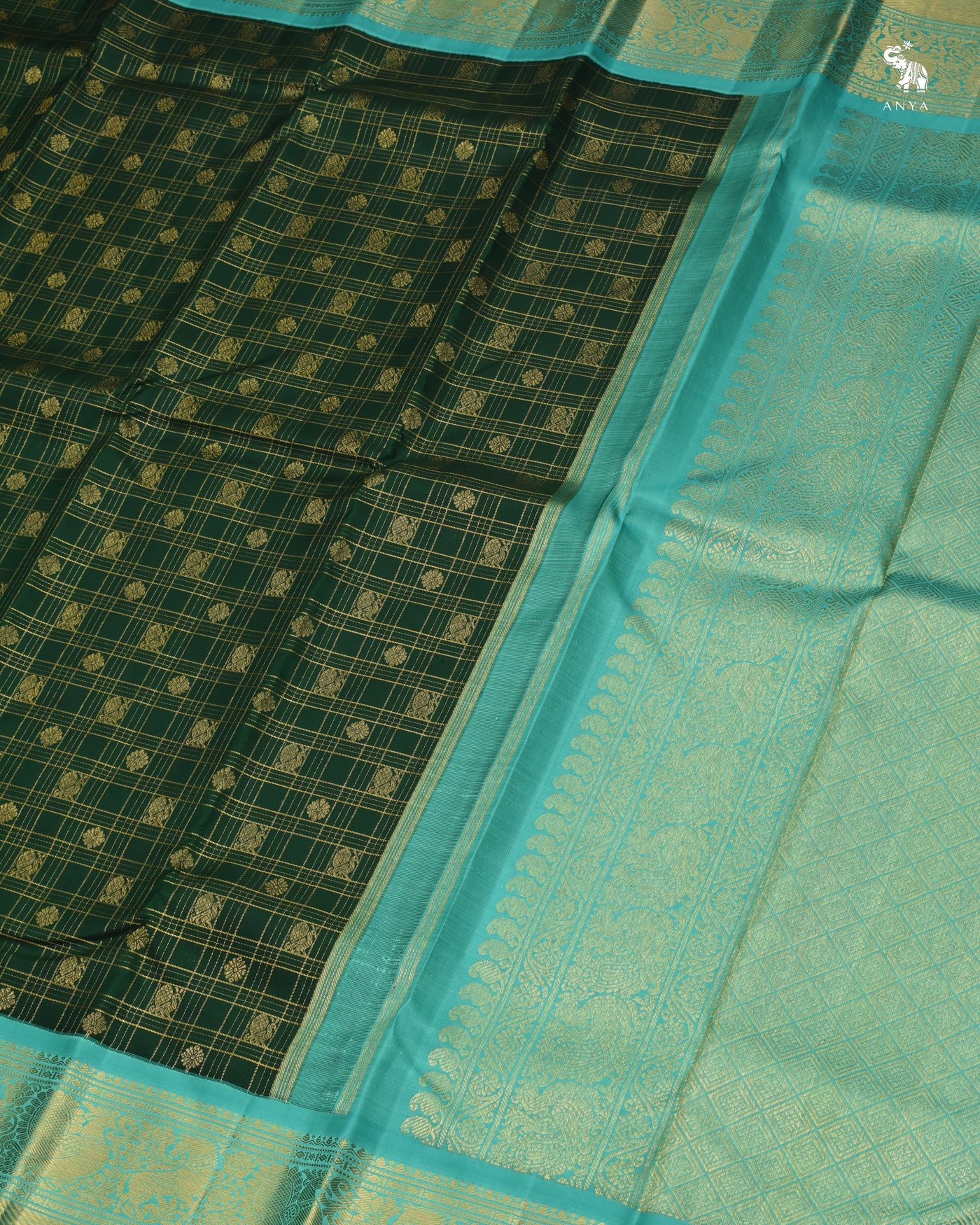Bottle Green Kanchipuram Silk Saree with Mayil Chakaram Design