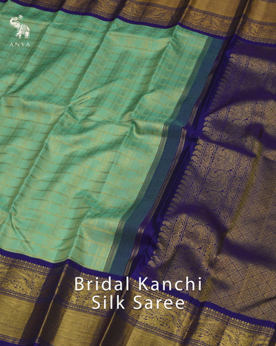 Pastel Green Kanchipuram Silk Saree with Zari Kattam and Butta Design