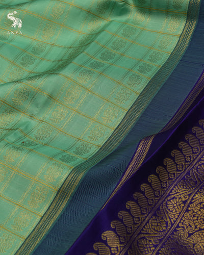 Pastel Green Kanchipuram Silk Saree with Zari Kattam and Butta Design