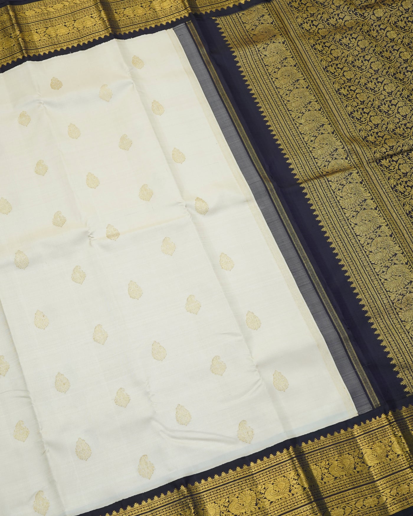 Off White Kanchi Silk Saree with Mango Butta Design