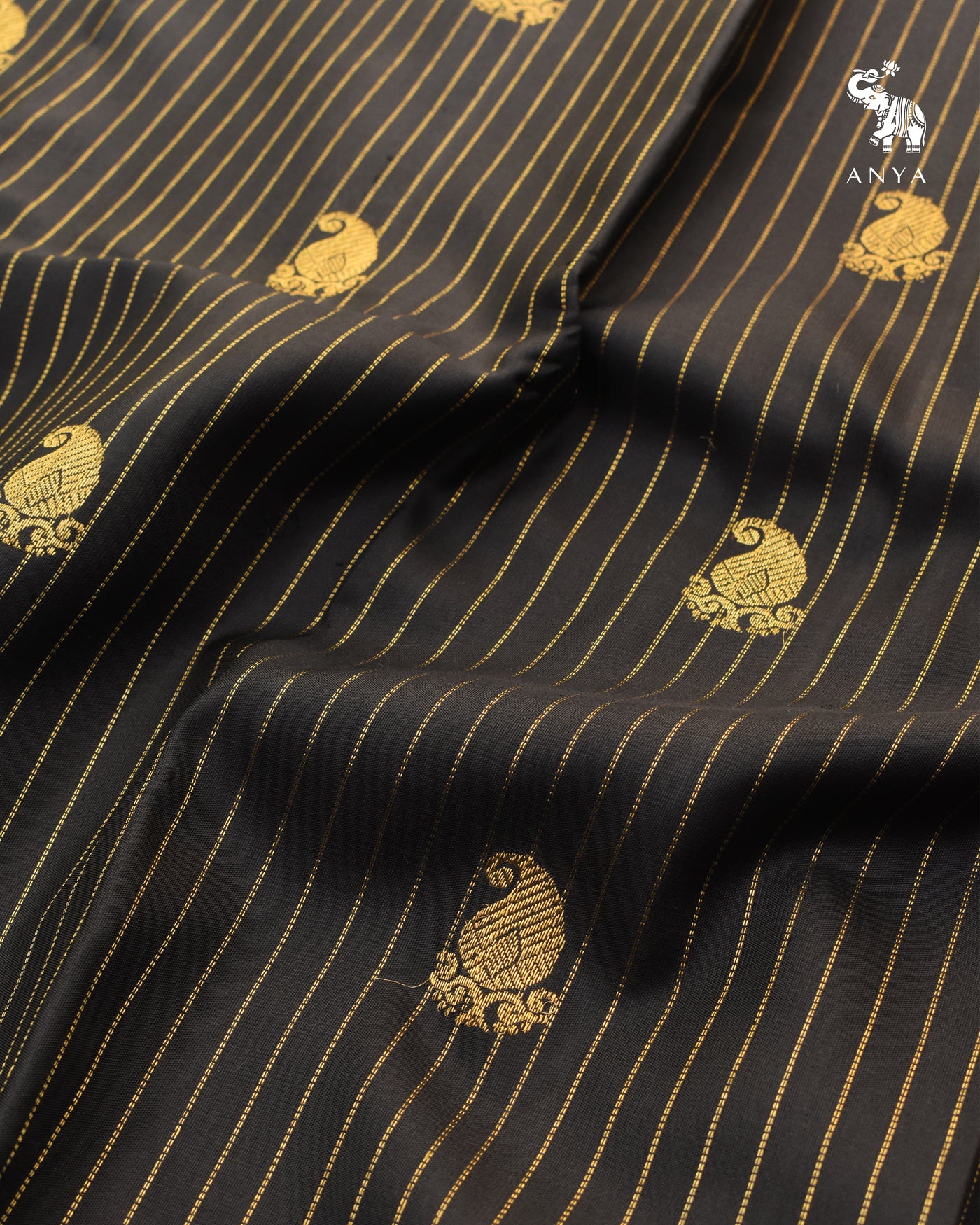Black Kanchi Silk Fabric with Muthu Seer Lines and Mango Butta Design
