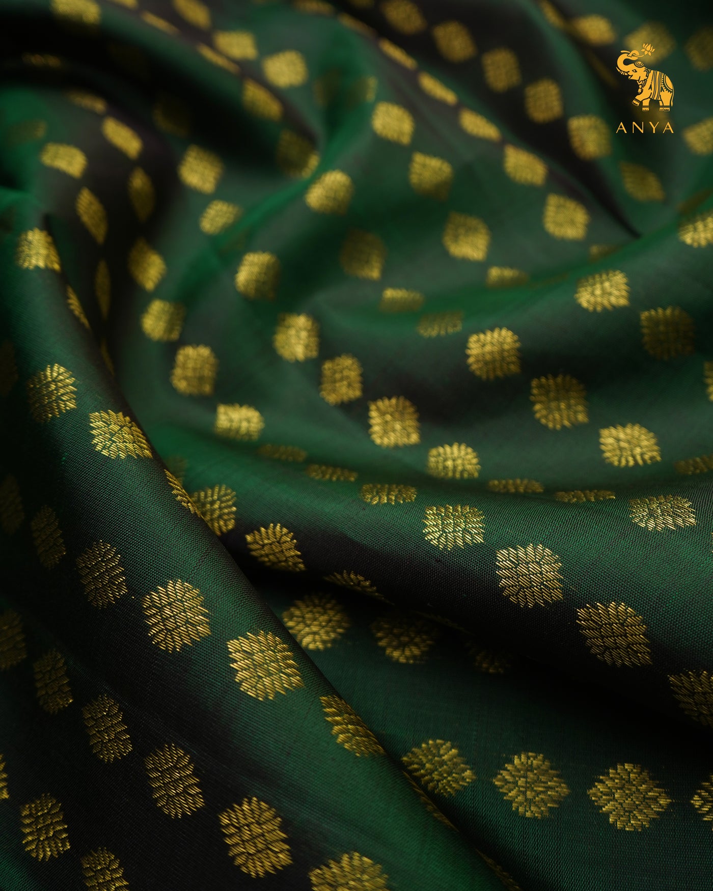 Bottle Green Kanchi Silk Fabric with Zari Butta Design