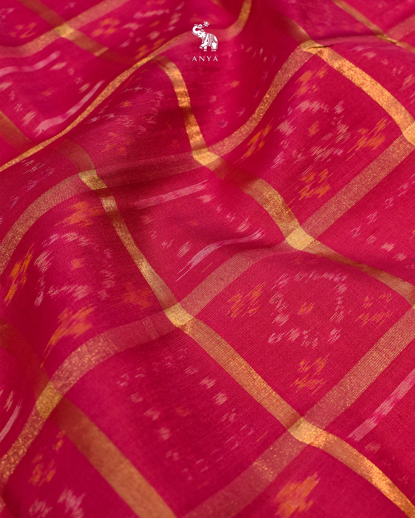 Rani Pink Ikkat Silk Fabric with Checks Design