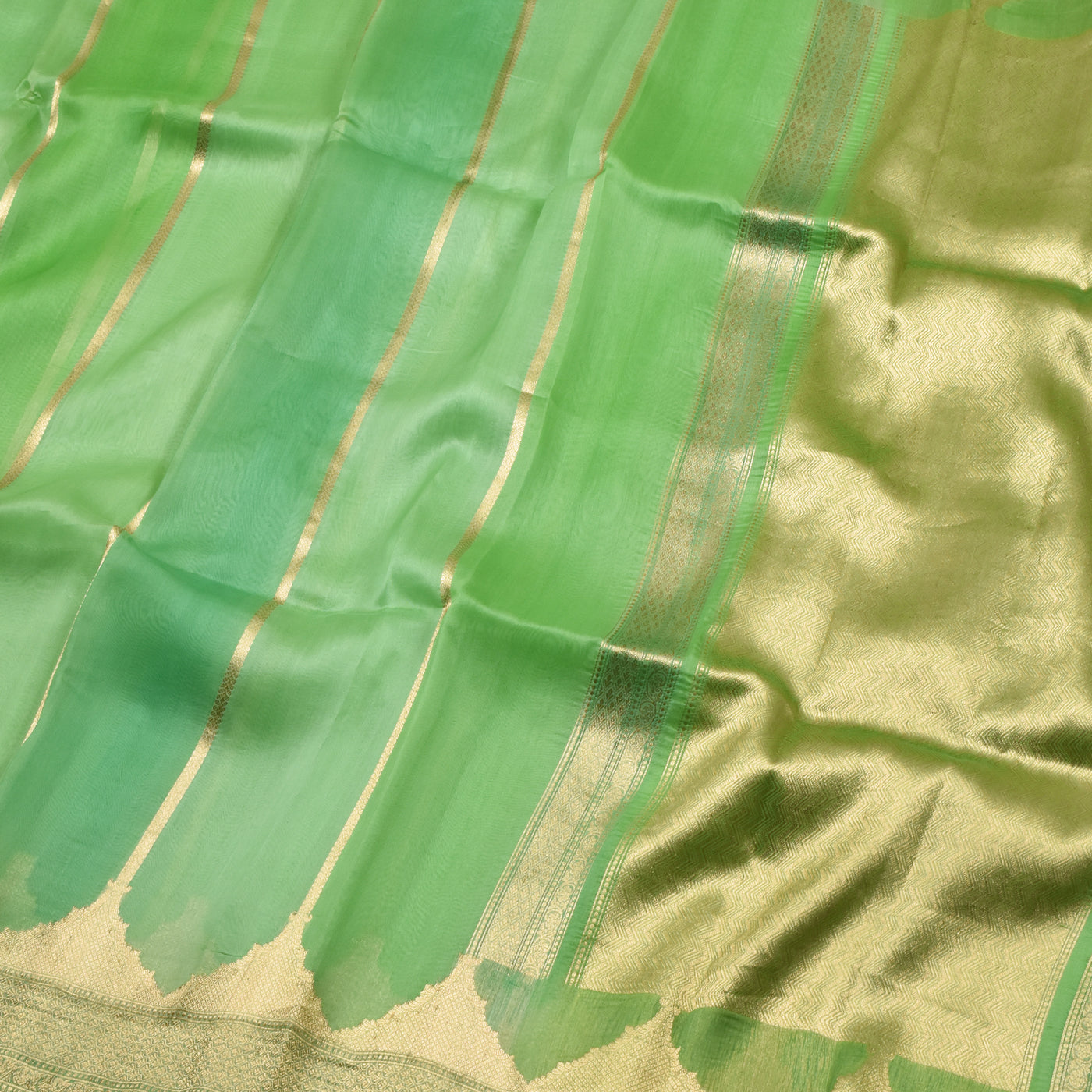 Apple Green Organza Saree with Horizontal Zari Stripes Design