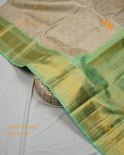 Off White Kanchipuram Silk Saree with Leaf Zari Design