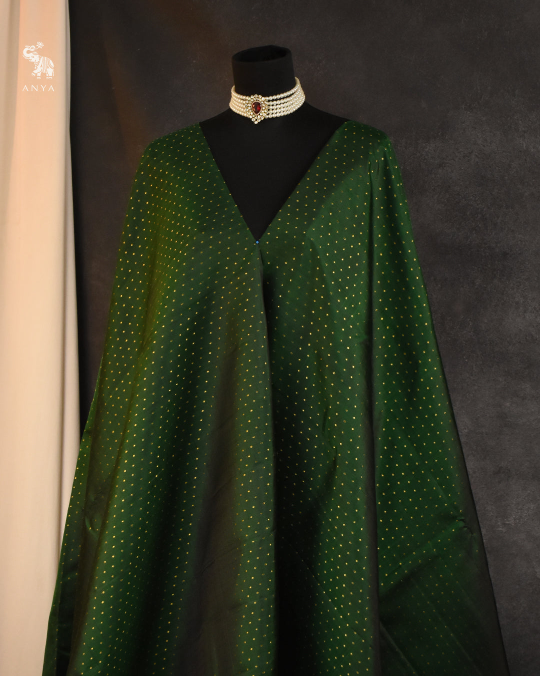 Bottle Green Kanchi Silk Fabric with Lakshadeepam Design