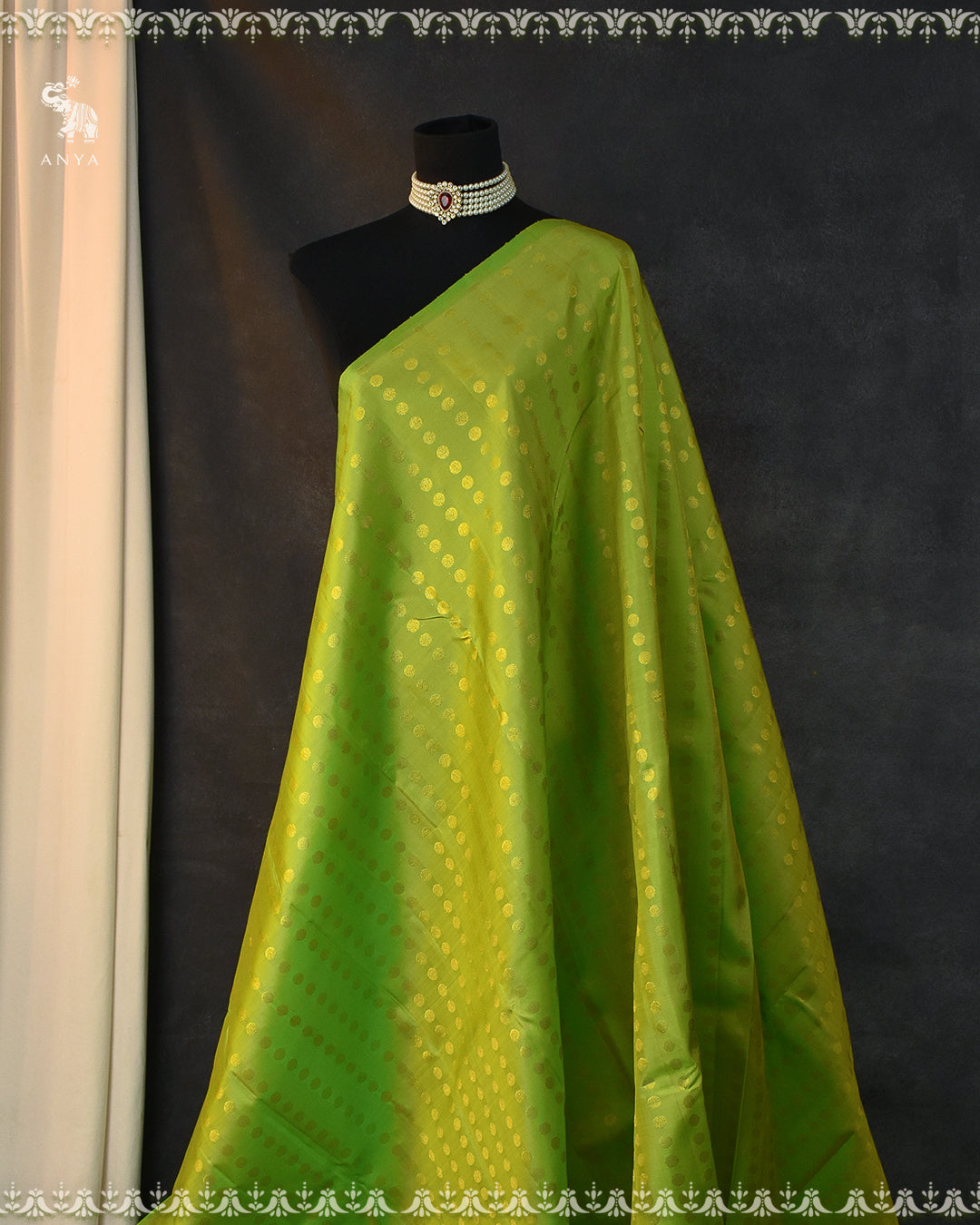 Parrot Green Kanchi Silk Fabric with Rudraksha Butta Design