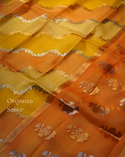 Yellow and Orange Organza Saree with Creeper Design