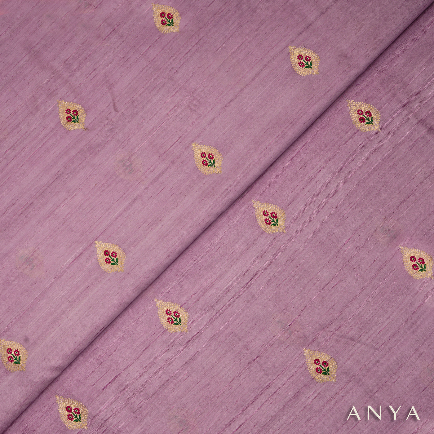 Lilac Tussar Raw Silk Fabric with Thilak Butta Design
