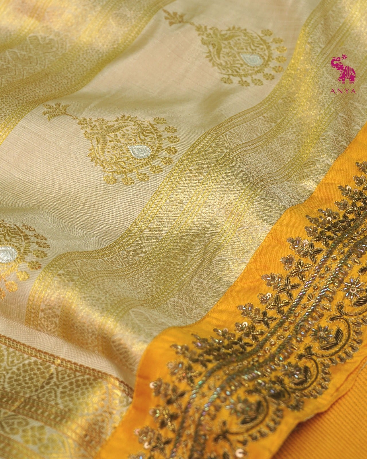 Mango Yellow Kanchi Silk Saree with Cross Zari Butta Design