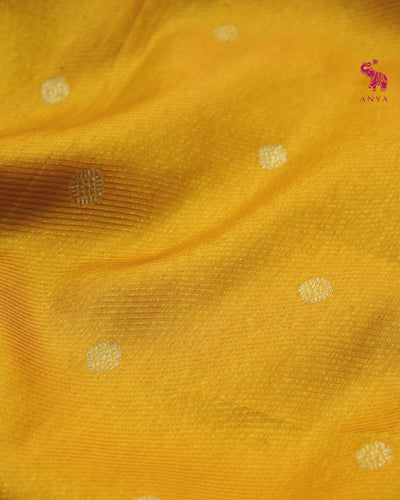 Mango Yellow Kanchi Silk Saree with Cross Zari Butta Design