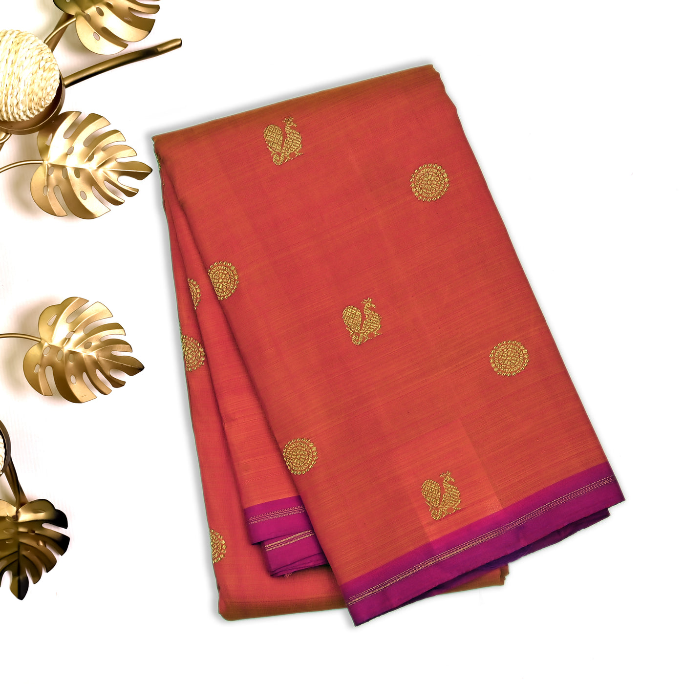 Orange Kanchipuram Silk Saree with Mayil Chakaram Design