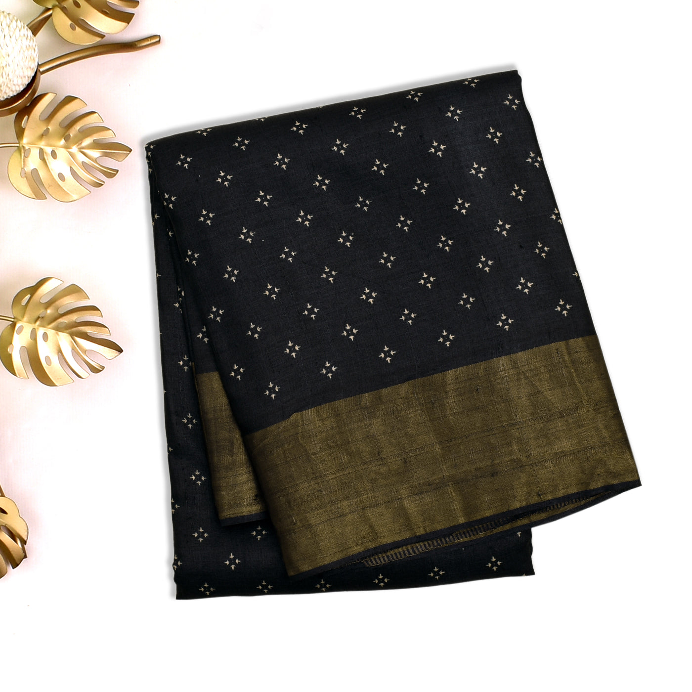 https://anyaonline.in/products/black-tussar-silk-saree-with-small-printed-design
